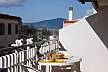 Esplendida terraza parcial vista al puerto Sassari